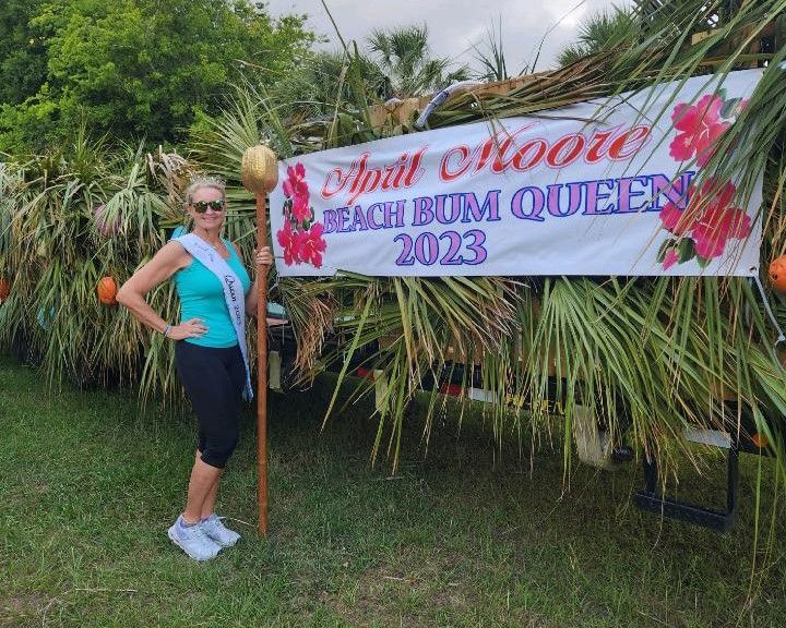 https://www.thesavannahian.com/content/images/2023/05/2023-Beach-Bum-Queen-April-Moore-with-her-float_Photo-credit_James-Moore-1.jpeg